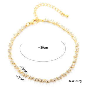 Detailed view of golden triangle star bracelet with cubic zirconia and lobster clasp detail