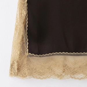 Sexy black lingerie top featuring delicate beige lace trim and intricate floral patterns