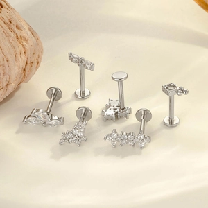 Surgical titanium flower labret studs set with cubic zirconia stones in silver finish