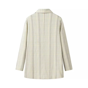 Back view detail of a beige plaid blazer showing its loose fit and classic checkered pattern