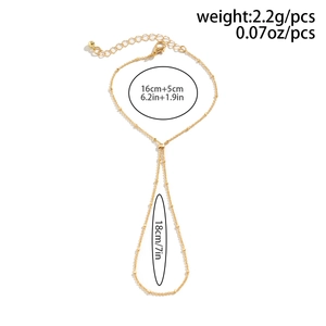 Detailed view of gold chain finger bracelet dimensions for wrist and hand jewelry