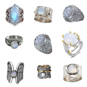 Collection of nine vintage moonstone rings in retro silver designs for men and women