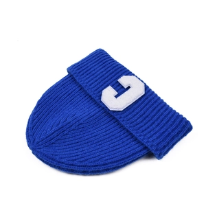 Navy blue knit beanie with white C letter patch and wide cuff for winter warmth