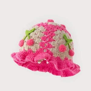 Handmade crochet bucket hat with cute cherry decorations and ruffled wavy brim for kids