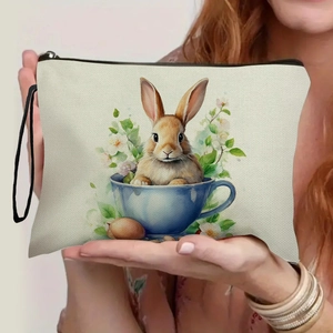 Easter canvas makeup bag with rabbit in teacup print and black wristlet strap
