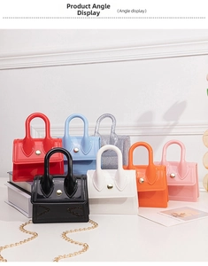 Mini jelly bags in multiple colors with round handles and metal chain straps