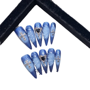 Blue ocean gradient handmade press-on nails with silver gothic cross and heart charms