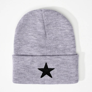 Light gray knitted beanie with black embroidered star on ribbed cuff, casual winter style