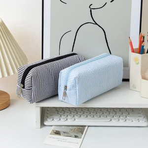 Seersucker striped pencil case with zipper closure and large capacity for stationery storage