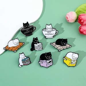 Detailed set of 8 cartoon cat enamel pins featuring kittens reading and drinking coffee