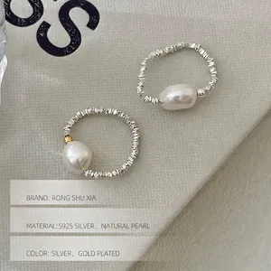 S925 sterling silver ring featuring natural baroque pearl with gold plated accents