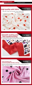 Detailed view of satin fabric texture with polka dot print and fine stitching edges