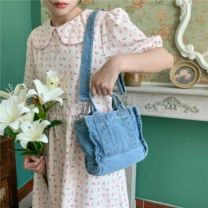 Vintage blue denim tote bag with wide strap and top handle for women casual daily use