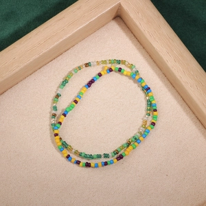 Handmade colorful glass seed bead bracelet with vibrant multi-color layers for women