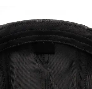 Close-up of the adjustable size label and premium stitching inside the black beret cap