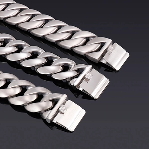 Detail view of silver cuban chain showing polished and brushed stainless steel finish