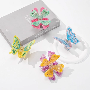 Elegant butterfly and clover acetate hair clips in vibrant mixed colors for women