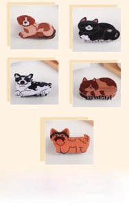 Detail view of five cute cartoon cat and dog hair claws with high gloss acetate finish