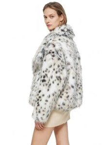 Detail of leopard print faux fur coat showing plush texture and wide lapel design