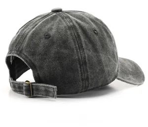 Detail of the vintage washed baseball cap with adjustable metal buckle at the back