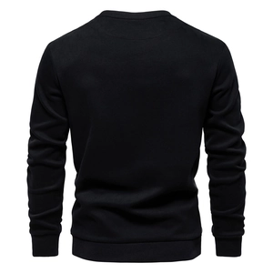 Detail view of the black sweatshirt back featuring ribbed cuffs and a premium knit texture