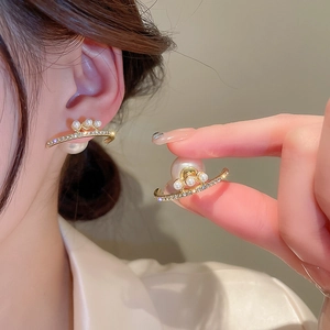 Curved gold earrings with rhinestones and faux pearls for a sophisticated women's look