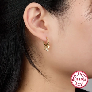 Elegant gold S925 sterling silver earrings with star, moon and cross charms for women