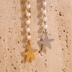 Vintage 18K gold plated starfish and pearl asymmetrical necklace in gold and silver