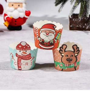 Detail von Weihnachts Muffinförmchen mit Weihnachtsmann, Schneemann und Rentier Motiven