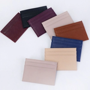Flat lay of slim PU leather card holders in eight colors featuring Saffiano texture