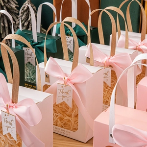 Elegant gift bags with transparent windows, ribbon bows and Best For You print
