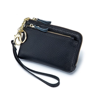 Minimalist black genuine leather coin purse with wristlet and dual gold zippers
