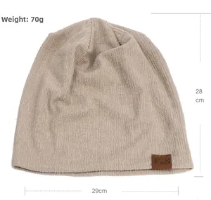 Detailed size view of beige knit beanie with 28x29cm dimensions and leather F&S label