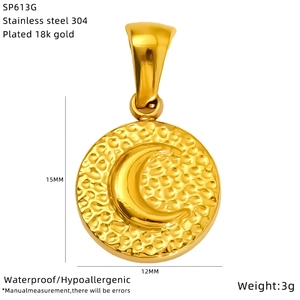 Detailed view of an 18K gold plated moon pendant with dimensions 15mm by 12mm