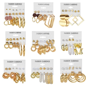 Detail view of 6-piece earring set featuring geometric hoops, pearls, and crystals in gold