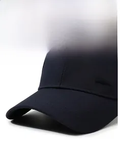 Close-up of navy blue baseball cap with metallic Davia logo and textured fabric