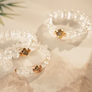 Natural White Crystal Beaded Bracelet With Golden Clover Heart Charm Elegant Handmade Elastic Jewelry For Women
