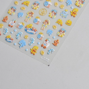 Detail of 3D summer embossed nail stickers with cartoon sea animals and girl designs