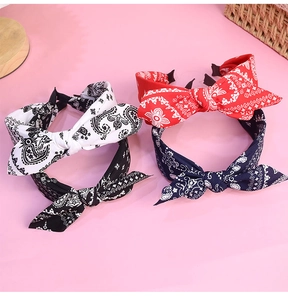 Three-color paisley bandana headbands with large bows in black, red, and navy blue