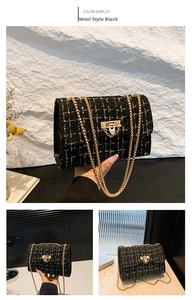Close-up of black plaid tweed handbag with golden chain strap and geometric lock