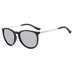 Fashionable round frame sunglasses with black matte frames and slim silver metal temples