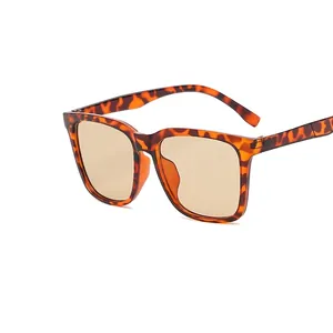 Fashionable square tortoise shell sunglasses with amber lenses in a vintage trendy style