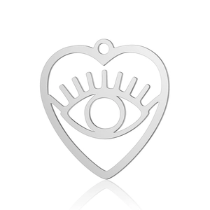 Detail of silver heart-shaped stainless steel pendant with eye engraving and hollow design