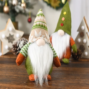 Charming green and orange Christmas gnomes with knit hats on a festive holiday background