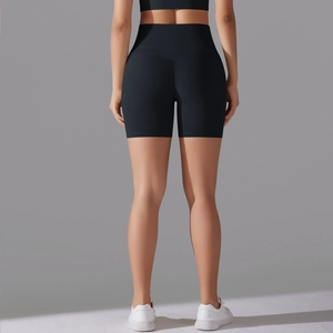 Rear view of black high-waisted yoga shorts showing seamless butt-lifting design