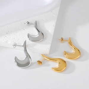 Boucles d'oreilles croissants en acier inoxydable doré et argenté sur pierre
