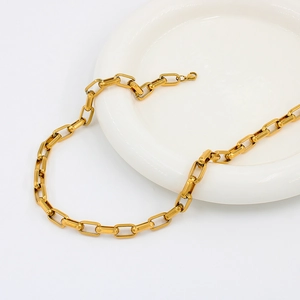 Minimalist gold stainless steel necklace and bracelet set with chunky rectangular links