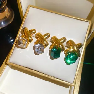 Elegant gold-tone cross square crystal stud earrings in luxury gift box display