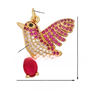 Detailed hummingbird pendant with red gemstones and sparkling zircon stone inlay