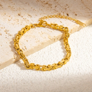 Detail of 18k gold plated Byzantine chain bracelet with adjustable lobster clasp closure